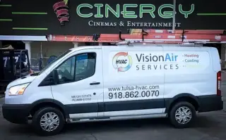 Vision Air van outside a commercial client's building, the Cinergy Cinema